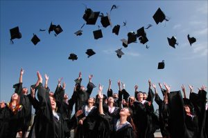 Students Throwing Their Caps In The Air